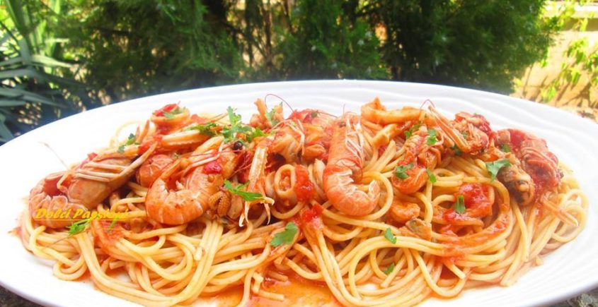Spaghetti con scampi e pomodorini