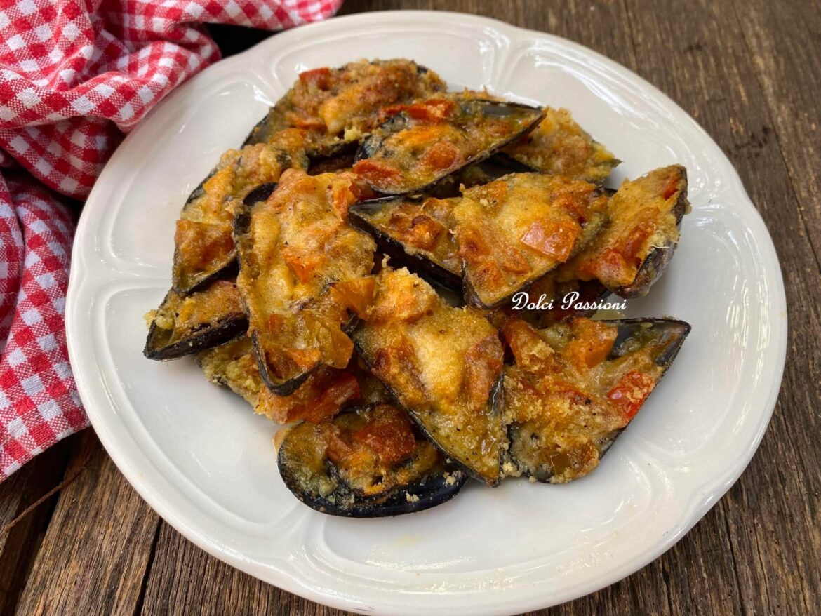 Cozze “Arraganate” con Pomodorini e Pecorino: la ricetta tradizionale di casa Palasciano-Bellino